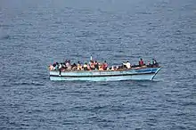 A boat with migrants, off the Libyan coast.