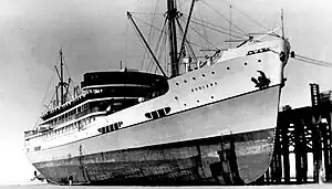 Koolama docked at low tide at Broome, c. 1940