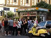 Customers at La Grattachecca di Sora Maria on Via Trionfale, Rome, Italy