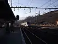 La Plaine station in 2011. The old station building was demolished in early 2019.  TGV 6576 en route from Geneva to Paris.