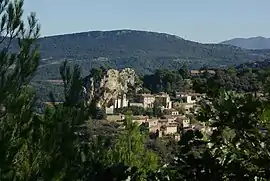 A view of La Roque-Alric from the nearby hillside