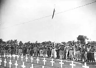 Australian troops inspecting the Labuan War Cemetery after its opening ceremony on 10 September 1945