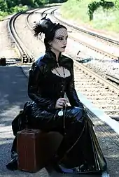 The goth fashion model Lady Amaranth. Goth fashion was inspired by British Victorian mourning costumes.