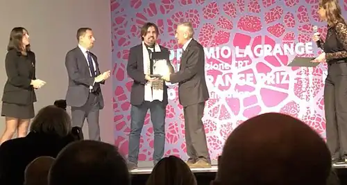 Cesar A. Hidalgo receiving the Lagrange Prize in Turin, Italy, 2018.