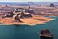 Aerial view looking south. Dominguez Butte left of center, nearest to water's edge.Boundary Butte behind right. (Tower Butte upper right corner. Padres Butte in lower right corner. LeChee Rock centered on horizon)