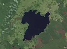 Image 32The scalloped bays indenting Lake Taupō's northern and western coasts are typical of large volcanic caldera margins. The caldera they surround was formed during the huge Oruanui eruption. (from Geography of New Zealand)