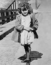 Young girl walking uphill