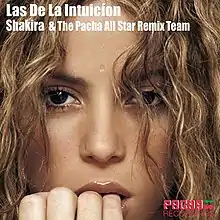 Artwork for "Las de la Intuición" remix album. A blonde woman is staring at the camera while biting her fingers. Above her image, the words "Las de la Intuición Shakira & The Pacha All Star Remix Team" are displayed in a white font.