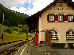 Two-story building with gabled roof