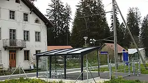 Covered shelter next to side platform