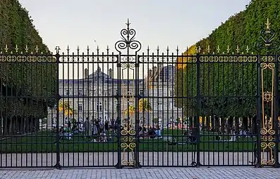 View through the gates on Rue Auguste Compte