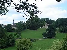 The church and chateau in Le Pré-d'Auge