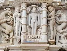 Tirthankara flanked by surasundaris and vyalas