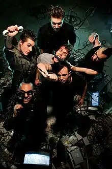 Left Spine Down Promo Photo, 2008; left to right: Jeremy Inkel (rear), kAINE D3L4Y (front), Jared Slingerland (rear), Tim Hagberg (middle), Denyss McKnight (front) and Matt Girvan.