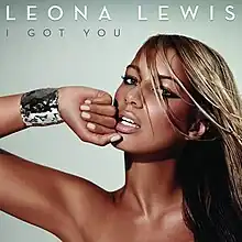 A blonde-haired woman with dark skin looks forward. Her right arm is angled and her hand clenched, which rests on her chin. She wears a silver bracelet on her right wrist. The background is grey, and above her are the words "Leona Lewis" in white capital letters, and below that "I Got You" in dark grey.