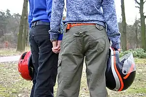 Same-sex couple holding hands