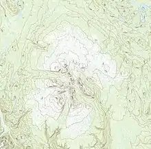 A green-shaded relief map of a large, valley-cut, oval-shaped mountain with respective labels and elevations.