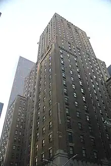 The New York Marriott East Side, a tall brick building, as seen from ground level