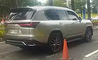 Lexus LX 600 F Sport rear view (VJA310)