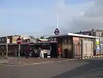 Western entrance facing Grove Green Road and bus stand.