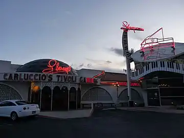 Neon-lit signs for the Liberace Museum and associated restaurant Tivoli Gardens. Both were operated by Liberace; the museum closed in 2010, and the restaurant moved shortly thereafter.