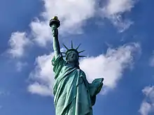 The Statue of Liberty (Liberty Enlightening the World), 1886, exhibits the radiate crown.