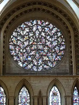 A very elaborate rose window with tracery forming a pattern like two ears of wheat.