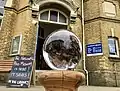 Lion poo in a resin sphere outside Sandown Library