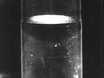 Superfluid phase at temperature below 2.17 K (−270.98 °C). In this state, the thermal conductivity is extremely high. This causes heat in the body of the liquid to be transferred to its surface so quickly that vaporization takes place only at the free surface of the liquid. Thus, there are no gas bubbles in the body of the liquid.