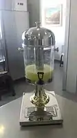 Drink dispenser containing lemonade.