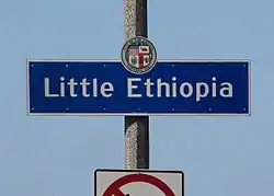 Little Ethiopia neighborhood sign located at the intersection ofFairfax Avenue and Olympic Boulevard