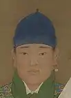 A young chinese boy wearing single ring-shaped earring on the left ear, Ming dynasty