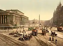 Colourised photo taken in the 1890s (note the partial view of the lost tympanum)