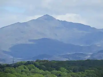 The mountains of Snowdonia to the north-east