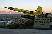 A Lockheed X-7 on display in the outdoor park.