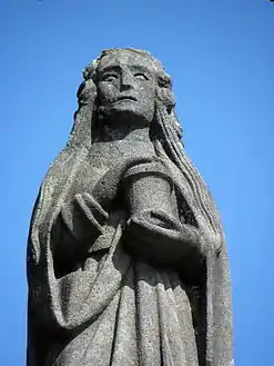 Mary Magdalene clutches her pot of embalming oil