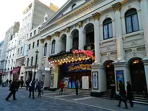 Image 49Music hall evolved into variety shows. First performed in 1912, the Royal Variety Performance was first held at the London Palladium (pictured) in 1941. Performed in front of members of the Royal Family, it is held annually in December and broadcast on television. (from Culture of the United Kingdom)