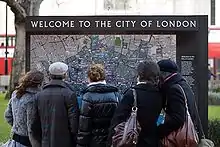 Image 10Tourists consulting a map near St Paul's Cathedral (from Tourism in London)