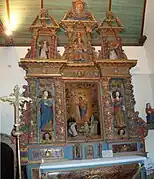 The baroque "Rosary" altarpiece in the Église Sainte-Geneviève at Loqueffret