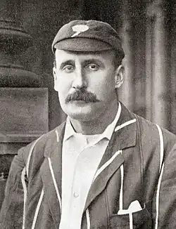 A cricketer preparing to bat