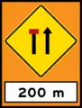 Left lane closed sign