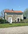 The surviving station building at Louches.