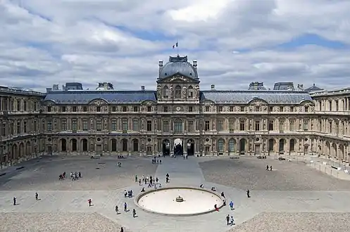 The Lescot wing from 1546 to 1553 (left of the tower) and Lemercier wing from 1624 to 1639) (right of the tower) in the interior of the Cour Carrée of the Louvre, in the Renaissance style