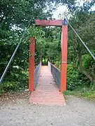 The suspension bridge over the Lugton Water.