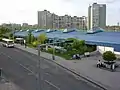 Exterior of Luka station with bus stop