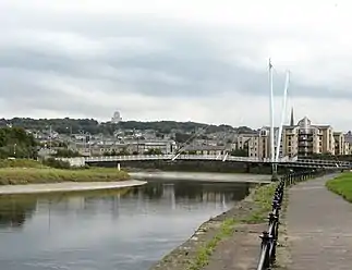 Lune at the Lune Millennium Bridge, with Lancaster in background