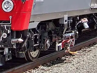 Contact shoe on Metro-North M8 railcar, designed for both over- and under-running third rail