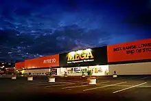 The front of the Glenfeild, Auckland Mitre 10 MEGA store at dusk