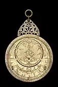 photograph of an astrolabe with a geared calendar