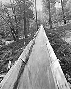 Water flowing down a V-flume near Sugar Pine, California.